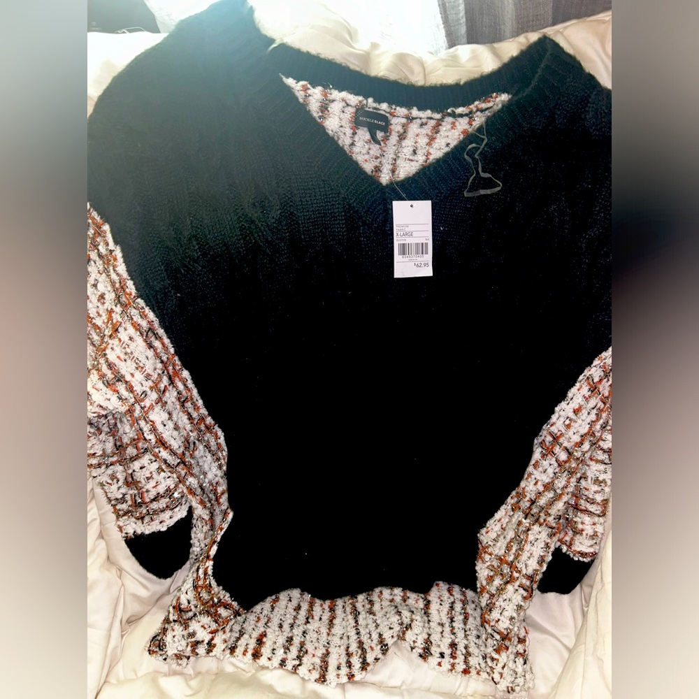 Buckle Black sweater.